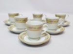 SCHIMIDT - Elegante e lindo jogo de 06 xícaras para café finamente executadas em porcelana de ótima qualidade e manufatura, ricamente adornadas por motivos florais e filetes á ouro. Medem 06 x 10 cm. Bom estado de conservação.
