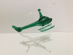 ALEMANHA - Belíssima e delicada escultura finamente executada em cristal de ótima qualidade e manufatura alemã representando belo helicóptero, em tonalidades translúcida e verde. Med. 15 x 7 x 13CM. Perfeito estado de conservação.