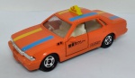 Miniatura Tomica Tomy Nissan Cedric 4 Door HT Táxi - metal  laranja escala: 1:62  Fabricada no Japão  item de coleção sem embalagem  muito bem conservado- sem avarias