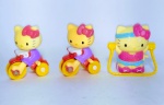 Lote com 3 Bonequinhas com movimentos à corda - Hello Kitty - Promocional Lacta - Pula corda  e duas no triciclo - Medida maior: 7,5 cm de altura.