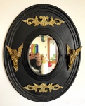 Espelho oval com aplicações em bronze. Artesanal 50x40cm 