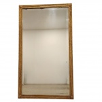 Espelho bisotado, Borda em madeira no tom dourado. Medida: 128cm x 74cm. Obs: no estado.