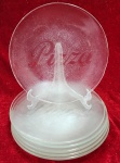 Conjunto contendo seis pratos rasos, em vidro texturizado  com escrita em relevos pizza. Medida: 24cm.