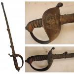 COLECIONISMO - Espada república, Início do século XX,  cabo com ranhuras horizontais para melhorar a aderência da mão. 90cm. Obs. lamina no estado.