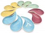 NADIR - Conjunto de 11 petisqueiras em faiança da manufatura Nadir. Medidas: 21 cm x 11 cm.