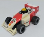 Miniatura F1 - DyDo Instituto Ayrton Senna -  McLaren Honda  Ayrton Senna -  # 12  plástico  rodas de borracha - 5,5cm - item de coleção muito bem conservado (partes brancas à esquerda amareladas  vide foto)