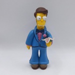 Boneco ou action figure Os Simpsons - Homer noivo. Fabricado pela TPF. Mede 9.5cm de altura