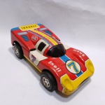 Brinquedo antigo de lata Ferrari de corrida com patrocínio Shell STP seiko - Funcionando fricção - Fabricado pela Alfema Norte no Brasil em parceria com a Masuda do Japão. Mede 15cm de comprimento