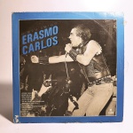 Vinil Erasmo Carlos: Meu Amigo. Produto Original. Gravadora Elenco. Fabricado e distribuído por Polygram do Brasil Ltda. 1983. Capa (escurecida, com pontos de oxidação e desgastes do material)/contracapa (com pontos de oxidação, escurecida e com desgastes do material) em regular estado de conservação, manchas/pontos de oxidação, marcação do disco, com sinais de uso, manuseio e desgastes. Contém plástico de proteção do disco, com rasgos. Disco com riscos, mesmo que superficiais, podem ocasionar algum nível de ruído na audição. Não contém encarte. Lado A 6 faixas. Lado B 8 faixas.