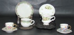 PORCELANA, Quatro xícaras de coleção com seus respectivos pires em porcelana esmaltada, sendo: A) 1 na tonalidade branca com pintura de flores e folhagens em policromia da manufatura QUEENS (4x6x4,5cm), B) 1 na tonalidade branca, decorado com guirlanda floral em policromia, pires apresenta fio de cabelo (3x6x4,5cm) e C) 2 na tonalidade branca, pintura furtacor, decorado com flores e folhagens em policromia e realces em douração (2,5x4x6cm).