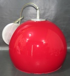 LUMINÁRIA, um lustre de teto para 1 lâmpada, anos 70, formato de meia esfera, confeccionado em vidro na tonalidade vermelha, com interior pintado em branco leitoso. 57x26cm.