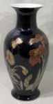 A & J COLLECTION, Vaso bojudo em porcelana esmaltada na tonalidade preta, com pintura de flores, folhagens e borboleta em rica policromia. Med.: 31x10,5cm.