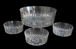 ARCOROC, França, Saladeira e 3 bowls em vidro translucido com lapidação bico de jaca e sulcos. Med.: 10,5x23cm / 5x10,5cm.