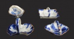 MINIATURAS, Quatro miniaturas de cestas confeccionadas em porcelana esmaltada, de feitios e decorações distintas. Maior: 2,5x4,5x3,5cm / Menor: 2,5x4x3,5cm.