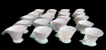 IVOTICI, Lote com 22 xícaras em terracota vitrificada esmaltada na tonalidade rosa, alça no feitio de folha. Algumas apresenta bicados. Med.: 6x9x5,5cm.