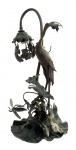 LUMINÁRIAS, Luminária francesa para 1 lâmpada, em bronze, estilo Art Nouveau, figura de garça em pé e rodeada por folhas. Falta 1 galho. Med.: 40cm.