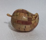 DIVERSOS, Fruto decorativo confeccionado em placas de osso. Med.: 9x6cm.
