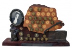 DIVERSOS, Quadro de formatura de contador ERNESTO A. WOLF, confeccionado em madeira, com inscrições TÉCNICOS CONTABILISTAS DE 1953, ESCOLA TÉCNICA DE COMÉRCIO PONTAGROSSENSE, TURMA "1º CENTENÁRIO DO PARANÁ", apresenta falhas na placagem e falta algumas fotos como mostra a foto. Med.: 26x44x7,5cm.