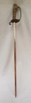 MILITARIA, uma (1) antiga espada inglesa feita para Marinha Brasileira, lâmina em aço com brasão da República e símbolo da Marinha, marca possessória MARQUES DA ROCHA (possivelmente pertenceu ao Capitão de Fragata Francisco José Marques da Rocha, conforme Ministério da Marinha, Decreto 6496 de 5 de Junho de 1907  Corpo da Armada Nacional), marca do fabricante representada pela estrela de David e placa interna em ouro ou metal dourado com as iniciais HW  Henry Wilkinson Pall Mall  London, sinais de oxidação, guarda mão em bronze, relevado com símbolo da Marinha, elementos vegetalistas e animais marinhos, empunhadura em madeira recoberta com aramado, pomo com símbolo da Marinha; bainha no estado, faltando parte do couro e ponteira, com acabamento em metal relevado em corda, medindo 88,5 cm comprimento, vide foto.