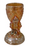 CARNIVAL GLASS, Paliteiro em vidro carnival glass, dito: Fogo, haste em formato de figura ricamente decorado. Med.: 10x4,5cm.