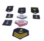 MILITARIA, Três platinas e seis patchs de militares da Marinha do Brasil. Med.: 14x6,5cm / 9x8cm / 6x5cm.
