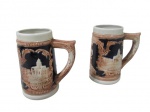 FAIANÇA, Par de tankards confeccionados em faiança vitrificada na tonalidade creme, decorado por paisagens, querubins e arabescos na tonalidade marrom. Med.: 13x11x6,5cm.