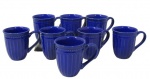 FAIANÇA, Oito canecas, confeccionadas em faiança vitrificada, decoração de gomos e perolados em relevo, pintura esmaltada na tonalidade azul.  Med.: 11x13x9cm.