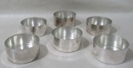 METAL PRATEADO, Seis recipientes para sobremesa em metal espessurado a prata, parte interna em vidro translucido. Necessitam banho. Med.: 4,5x9cm.