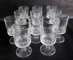 VIDRO - Onze taças para vinho em vidro translucido, lapidada por sulcos. Med.: 12x6,5cm.