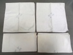 CAMA, MESA E BANHO, quatro (4) guardanapos, confeccionados em algodão, tonalidade branca, desenho floral no próprio tecido, marca possessória em linha azul clara, medindo 60 x 60 cm, usados e com manchas.