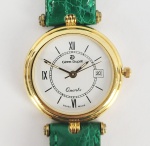 GIREN-DUPRE - RELOGIO COM CAIXA EM OURO 18K. I. MOVIMENTO QUARTZ. DOTADO DE CALENDÁRIO. PULSEIRA EM COURO NATURAL VERDE. SUIÇA. 28 MM DE DIAMETRO. 20 G (PESO TOTAL)