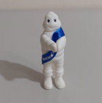 Promocional - Michelin, agarradinho de vinil com fita de cetim escrito Michelin. Ótimo estaado de conservação, mede aproximadamente 7 cm de altura.