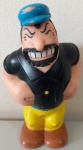 Boneco Brutus em vinil, da estrela. Apresenta marcas e desgates na pintura. Mede 13 de altura.