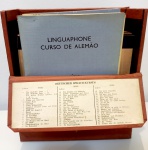 Box com  16 discos e 4 livros de curso de Alemão.