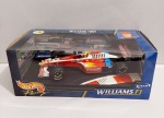 Williams F1 Team - Edição Hotwheels Racing - Ralf Schumacher  Miniatura de metal em escala 1/18, exemplar impecável fundido em metal, escala grande com aproximadamente 25 cm. de comprimento, está na caixa original e ainda lacrado na base, retirado somente para fotos e conferencia. Item altamente colecionável, e dificil de se encontrar no mercado nacional de brinquedos antigos e colecionaveis.