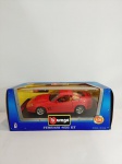 Ferrari 456 GT- Miniatura de metal em escala 1/25, exemplar impecável, carro pesado fundido em metal, escala grande com aproximadamente 20. de comprimento, está na caixa original e ainda lacrado na base, retirado somente para fotos e conferencia. Item altamente colecionável, e dificil de se encontrar no mercado nacional de brinquedos antigos e colecionaveis.