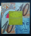 FOLDER COM CEDULA 10 REAIS BRASIL 2000 C - 331 POLIMERO COMEMORATIVA - FE - PEDRO A CABRAL - NUMERAÇÃO DA CEDULA IGUAL AO FOLDER - ATENÇÃO POSSUI DANOS POR ETIQUETAS NA CAPA