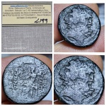 L199, Moeda Atribuída à República Romana, Cidade: Antioquia  Região: Síria Província: Síria, Denominação: AE,  Peso médio:7,63 g. Emitida por volta do ano (34/33 aC),Anverso: cabeça laureada de Zeus, à direita, Rev:  ,  Zeus sentado à esquerda, segurando Nike e cetro; data em exergo.