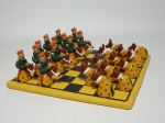 Arte popular: Belíssimo tabuleiro de dama, em cerâmica, de origem nordestina, com peças, sendo 12 representando bois e 12 representando cavaleiros (boi bumbá). Alto do Moura, Caruaru - PE. Confeccionadas por parentes do Mestre Vitalino. O tabuleiro mede 22 cm x 22 cm. (1 boi apresenta 1 chifre quebrado).