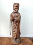 GERALDO (Tracunhaém, PE) "São Pedro" Escultura em bloco de madeira. Assinada e datada 1978. Alt. 90 cm.