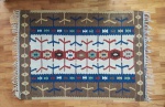 Tapete Kilim medindo 1,65 x 1,17 = 1,93m².
