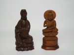 Duas esculturas em madeira, sendo que 1 representa a Deusa  e a outra o Buda. Ambas medindo 14 cm de altura.