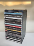 CD (15) -Porta CD em plástico rígido preto com cd's de diversos estilos.