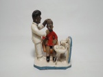 ARTE POPULAR - ROSA (Alto do Moura, PE) "Dentista" Escultura em barro cozido. Assinada. Alt. 15cm.
