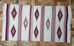 Tapete Kilim medindo 1,36 x 0,80 = 1,08m².