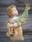 Antigo Anjinho em resina, vide detalhes nas fotos, para pesquisa. Med 9 x 7 Cm.