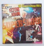 LP - Conservado e original disco de vinil - ELTON JOHN  - 18 Super Show Hits - STEREO - Ano: 1977 - K-TEL - Medida:  31 cm x 31 cm.