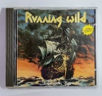 CD - Conservado e original COMPACT DISC - NOISE - RUNNING WILD - UNDER JOLLY ROGER  - Ano: 1987. Medida: 14 cm x 12 cm x 1 cm.