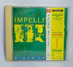 CD - Conservado e original COMPACT DISC - IMPELLITTERI - STAND IN LINE  - Ano: 1988 - TOKYO JAPAN - PRENSA JAPONESA - CBS Acompanha encarte. Medida: 14 cm x 12 cm x 1 cm. OBSERVAÇÃO: A tampa de acrílico está quebrada.