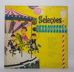 Disco de Vinil Original - LP - Seleções Carroussell - Com 15 lindas canções infantis - Disco na cor amarelo - Conforme fotos - Medida: 31 x 31 cm.